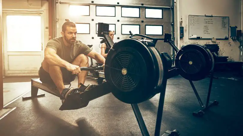 Man on Rowing Machine at the Gym