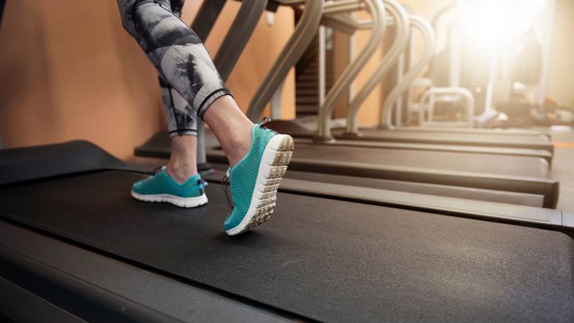 woman running on a treadmill